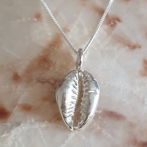 Cowrie shell pendant