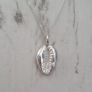 Cowrie shell pendant